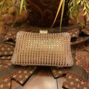 Sparkling Gold and Silver Clutch with Reflective Texture
